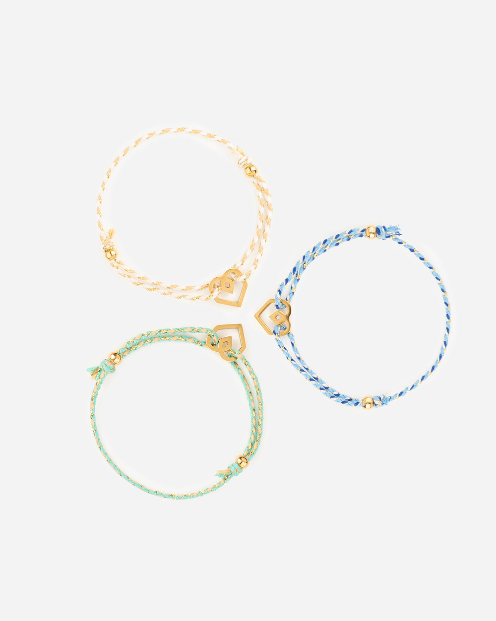 ARMBAND Cremekleurig met hartje